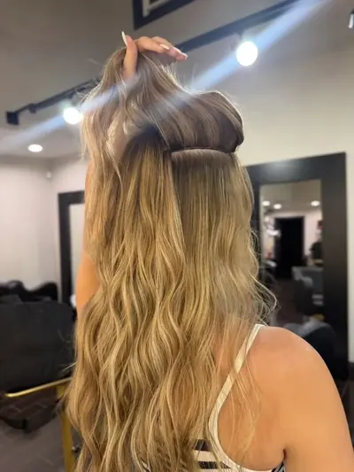 Hair extensions by Kirra Davis